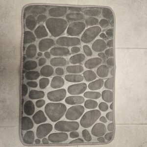 Enkel badrumsmatta i polyester med diskret mönster
